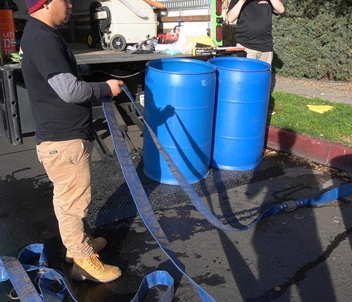 Filling Barrels With Flooding Sewage